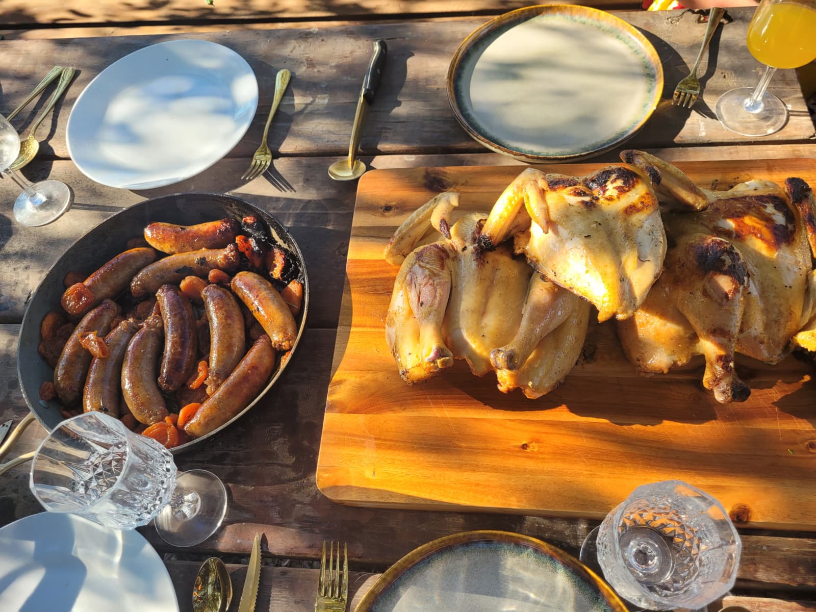 Sausages and roast chickens ready to share