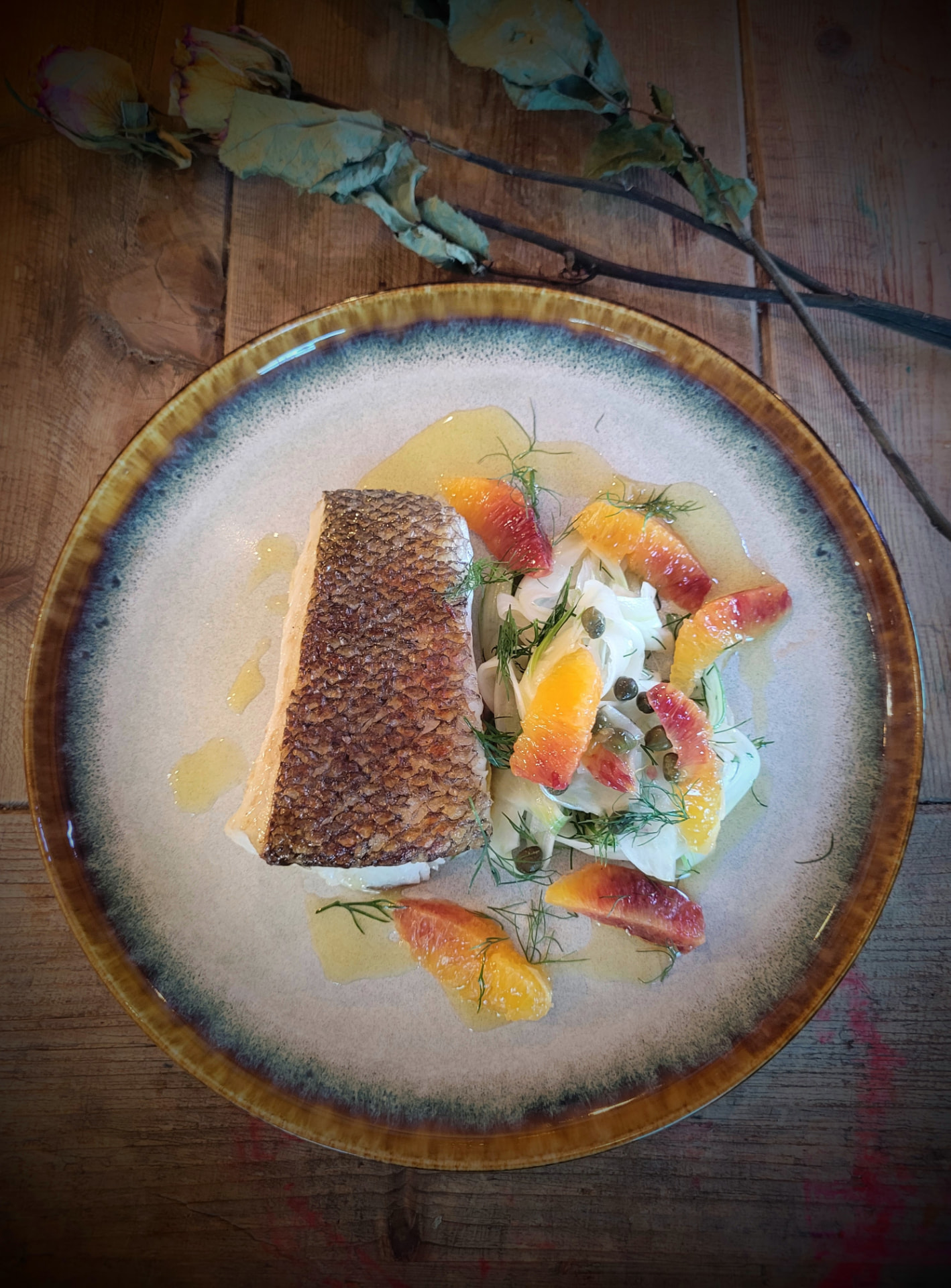 Crisp sea bass with blood orange and fennel salad